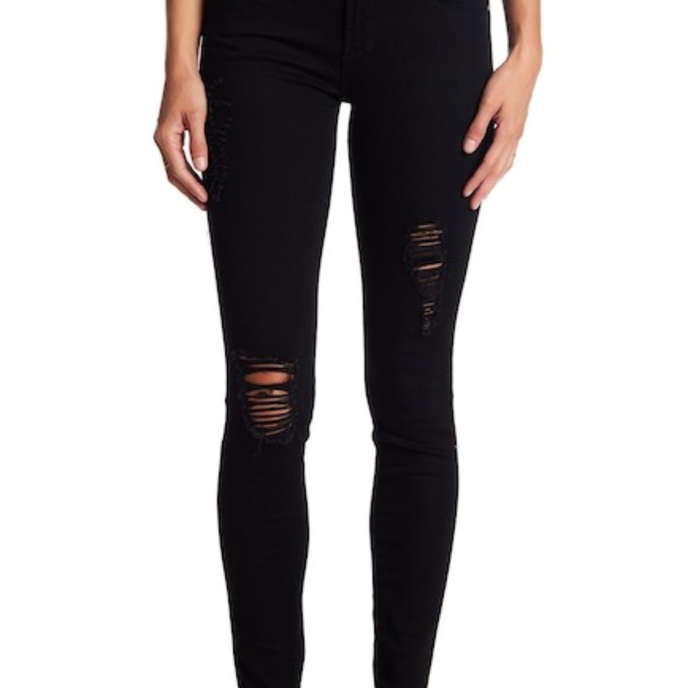 Destroyed black skinny jeans